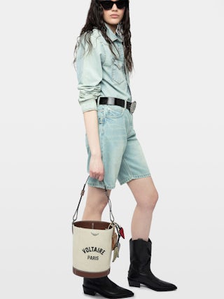 Z Bucket Voltaire Bag - Canvas and grained leather bucket bag with adjustable strap and wing signature.