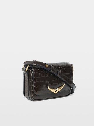 Le Zazi Croco Bag - Small croco-effect leather bag with adjustable shoulder strap and signature wings.
