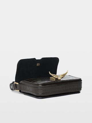 Le Zazi Croco Bag - Small croco-effect leather bag with adjustable shoulder strap and signature wings.