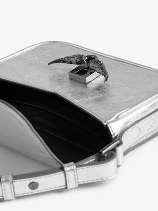 Le Zazi Vintage Metal Bag - Small bag in metallic leather with adjustable shoulder strap and signature wings.