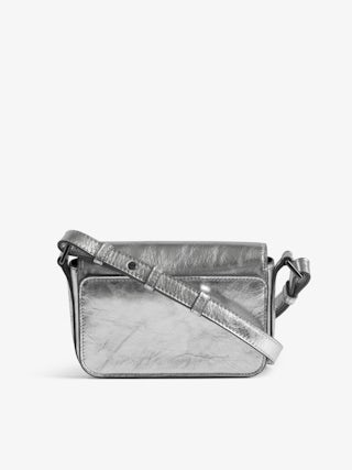 Le Zazi Vintage Metal Bag - Small bag in metallic leather with adjustable shoulder strap and signature wings.