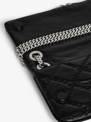 Rock II Quilted Monogram Clutch - Clutch in smooth quilted leather with adjustable metal chain and signature wings.