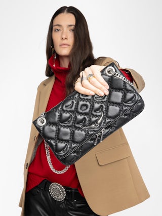 Rock II Quilted Monogram Clutch - Clutch in smooth quilted leather with adjustable metal chain and signature wings.
