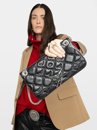 Rock II Quilted Monogram Clutch - Clutch in smooth quilted leather with adjustable metal chain and signature wings.