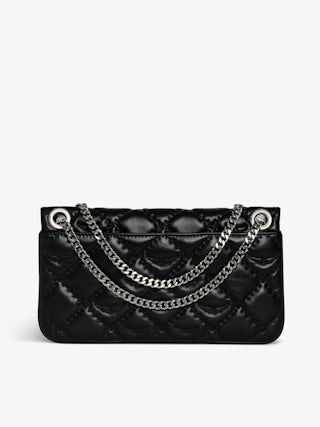 Rock II Quilted Monogram Clutch - Clutch in smooth quilted leather with adjustable metal chain and signature wings.