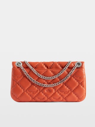 Rock II Quilted Monogram Clutch - Clutch in smooth quilted leather with sliding metal chain and signature wings.