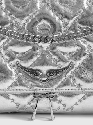 Clutch Rock II Metal Monogram - Clutch in quilted metallic leather with sliding metal chain and signature wings.