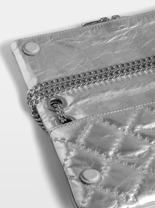 Clutch Rock II Metal Monogram - Clutch in quilted metallic leather with sliding metal chain and signature wings.