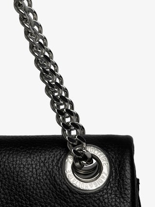 Rock II Clutch - Clutch in grained leather with sliding metal chain and signature wings.