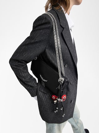 Rock II Clutch - Clutch in grained leather with sliding metal chain and signature wings.