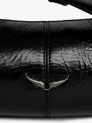 Le Roudoudou Vintage Patent Bag - Patent leather bag with vintage-inspired effect, adjustable shoulder strap and wings signature.