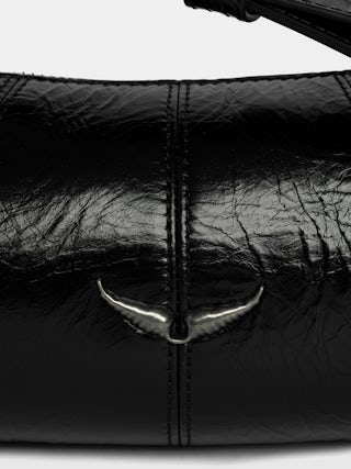 Le Roudoudou Vintage Patent Bag - Patent leather bag with vintage-inspired effect, adjustable shoulder strap and wings signature.