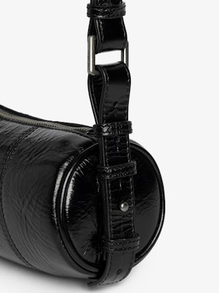 Le Roudoudou Vintage Patent Bag - Patent leather bag with vintage-inspired effect, adjustable shoulder strap and wings signature.