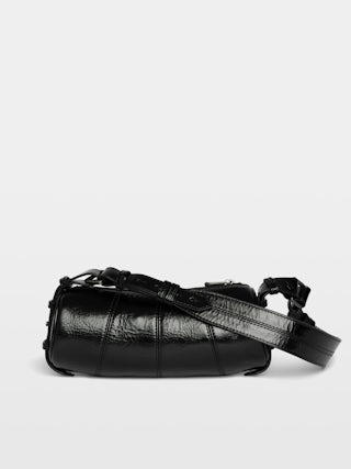 Le Roudoudou Vintage Patent Bag - Patent leather bag with vintage-inspired effect, adjustable shoulder strap and wings signature.