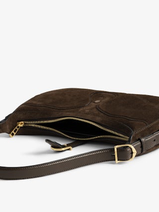 Moonrise Bag - Baguette bag in suede with leather handle and signature wings.