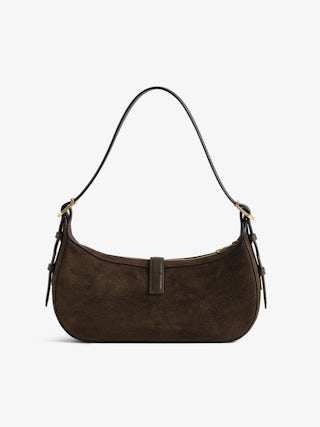 Moonrise Bag - Baguette bag in suede with leather handle and signature wings.