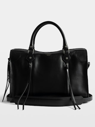 Sunny XL Bag - Zadig & Voltaire x EGONlab reimagine the iconic carryall in smooth black leather. Oversized and effortlessly cool, it’s made to hold everything you need and more, from workdays to weekends. Wear it by the handles or on the shoulder for versatile, everyday edge.