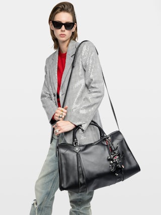 Sunny XL Bag - Zadig & Voltaire x EGONlab reimagine the iconic carryall in smooth black leather. Oversized and effortlessly cool, it’s made to hold everything you need and more, from workdays to weekends. Wear it by the handles or on the shoulder for versatile, everyday edge.