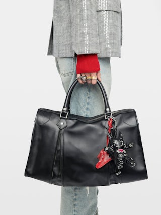 Sunny XL Bag - Zadig & Voltaire x EGONlab reimagine the iconic carryall in smooth black leather. Oversized and effortlessly cool, it’s made to hold everything you need and more, from workdays to weekends. Wear it by the handles or on the shoulder for versatile, everyday edge.