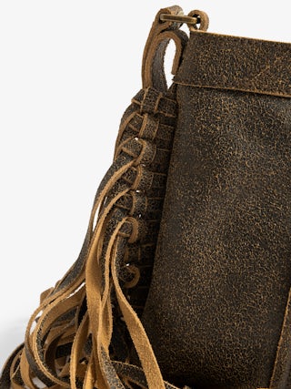Sunny Moody Fringes Bag - Zadig & Voltaire x EGONlab bring a rebellious twist to bohemian spirit. Crafted in supple brown leather, its cascading fringes and bold attitude move with you. Wear it crossbody or on the shoulder for effortless, untamed style.