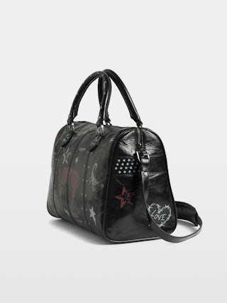 Sunny Medium Vibe Punk Bag - Patent leather effect bag with vintage-inspired punk tag, adjustable shoulder strap and wings signature.