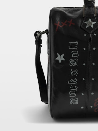Sunny Medium Vibe Punk Bag - Patent leather effect bag with vintage-inspired punk tag, adjustable shoulder strap and wings signature.