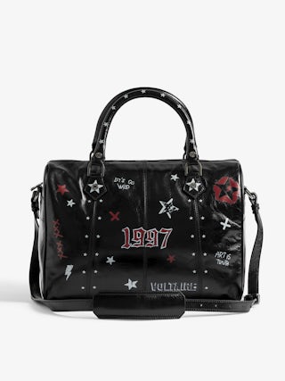 Sunny Medium Vibe Punk Bag - Patent leather effect bag with vintage-inspired punk tag, adjustable shoulder strap and wings signature.