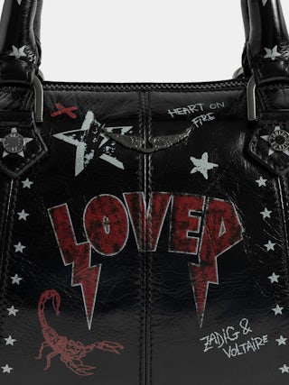 Bag XS Sunny Vibe Punk - Mini bag in patent leather with vintage effect, punk tag, adjustable shoulder strap and wings signature.