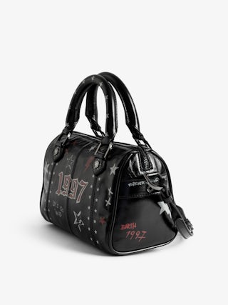 Sunny XS Punk Bag - Mini bag in patent leather with vintage effect, punk tag, adjustable shoulder strap and wings signature.