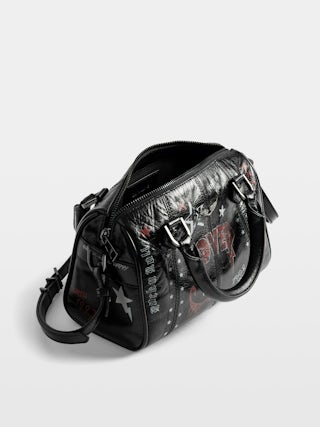 Bag XS Sunny Vibe Punk - Mini bag in patent leather with vintage effect, punk tag, adjustable shoulder strap and wings signature.
