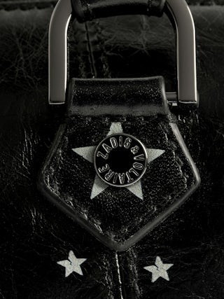 Bag XS Sunny Vibe Punk - Mini bag in patent leather with vintage effect, punk tag, adjustable shoulder strap and wings signature.