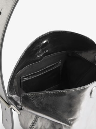 Baby Jane Vintage Metal Bag - Metallic leather bag, with adjustable shoulder strap and wings signature.