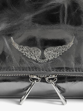 Rock Vintage Metal Clutch - Metallic leather clutch with double leather and metal chains and rhinestone-embellished wings.