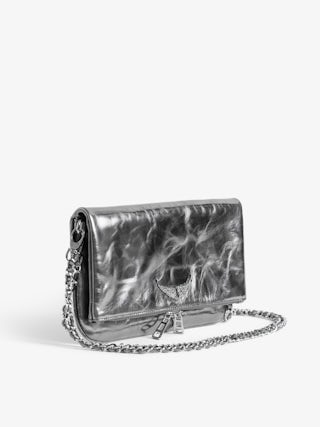 Rock Vintage Metal Clutch - Metallic leather clutch with double leather and metal chains and rhinestone-embellished wings.