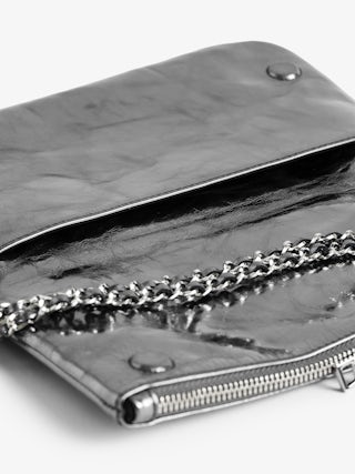 Rock Vintage Metal Clutch - Metallic leather clutch with double leather and metal chains and rhinestone-embellished wings.