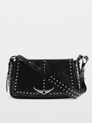 Tasche Le Zouzou Vintage Lackleder Studs - Kleine Tasche aus Lackleder mit Vintage-Effekt, Nieten, verstellbarem Schulterriemen und Signature-Flügeln.