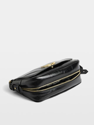 Le Zouzou Vintage Patent Bag - Small vintage effect patent leather bag with adjustable shoulder strap and signature wings.