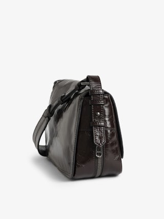 Sac Le Zouzou Vintage Patent - Petit sac en cuir vernis effet vintage, à bandoulière ajustable et ailes signature.