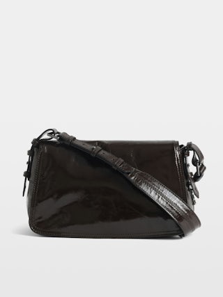 Le Zouzou Vintage Patent Bag - Small patent leather bag with vintage effect, adjustable shoulder strap and signature wings.