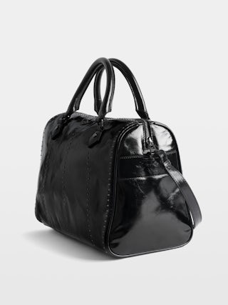 Sunny Medium Vibe Studs Bag - Patent leather bag with vintage effect and studs, adjustable shoulder strap and handles with metal wings signature.