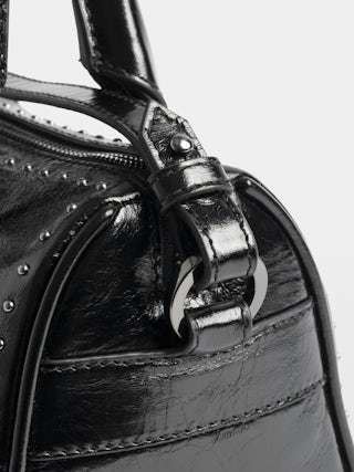 Sunny XS Vibe Studs Bag - Patent leather bag with vintage effect and studs, adjustable shoulder strap and handles with metal wing signature.