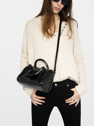 Sunny XS Vibe Studs Bag - Patent leather bag with vintage effect and studs, adjustable shoulder strap and handles with metal wing signature.