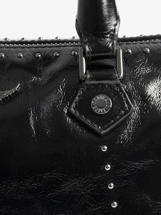 Sunny XS Vibe Studs Bag - Patent leather bag with vintage effect and studs, adjustable shoulder strap and handles with metal wing signature.
