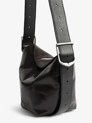 Baby Jane Vintage Patent Bag - Vintage-effect patent leather bag with adjustable shoulder strap and embossed wings signature.