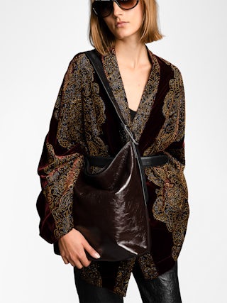 Jane Hobo Vintage Patent Bag - Hobo bag in vintage effect patent leather, with adjustable handle and embossed wings signature.