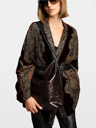 Sac Jane Hobo Vintage Patent - Sac hobo en cuir vernis effet vintage, à anse ajustable et signature ailes débossées.