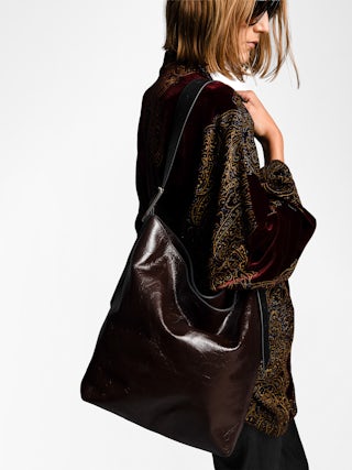 Jane Hobo Vintage Patent Bag - Hobo bag in vintage effect patent leather, with adjustable handle and embossed wings signature.