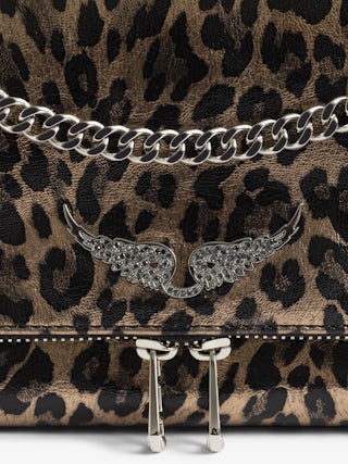 Rock II Metal Leopard Clutch - Metallic leather clutch with leopard effect featuring sliding metal chain and signature wings.