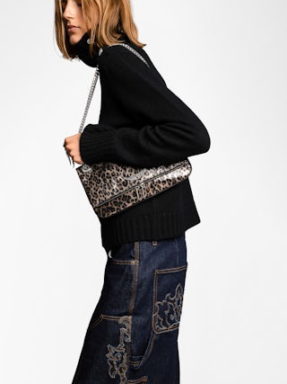 Rock II Metal Leopard Clutch - Metallic leather clutch with leopard effect featuring sliding metal chain and signature wings.