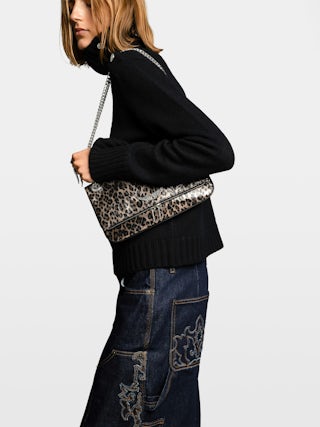 Rock II Metal Leopard Clutch - Metallic leather clutch with leopard effect featuring sliding metal chain and signature wings.